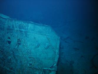 Large piece of twisted steel plate on seabed